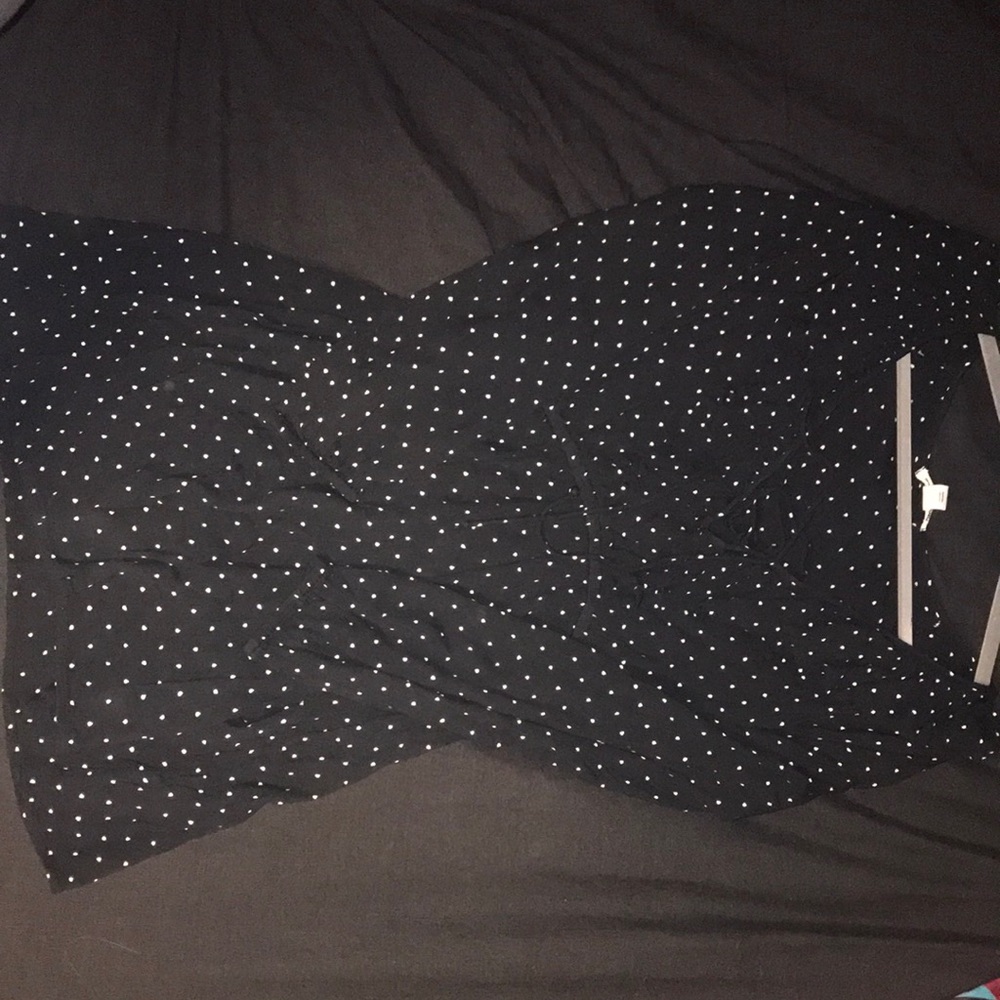 A Black Billabong linen dress with white polkadot